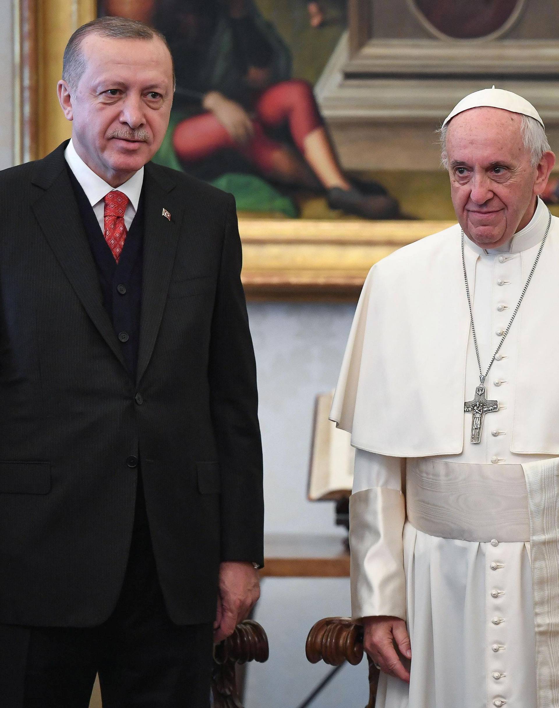 Pope Francis and Turkish President Tayyip Erdogan pose during a private audience at the Vatican