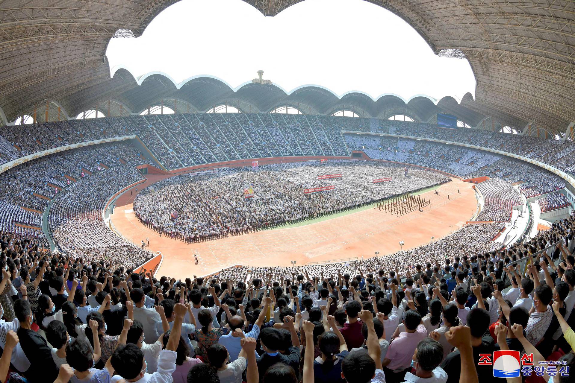 People attend a mass rally denouncing the U.S. in Pyongyang