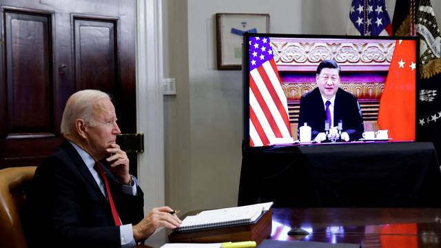 FILE PHOTO: U.S. President Biden speaks virtually with Chinese leader Xi from the White House in Washington