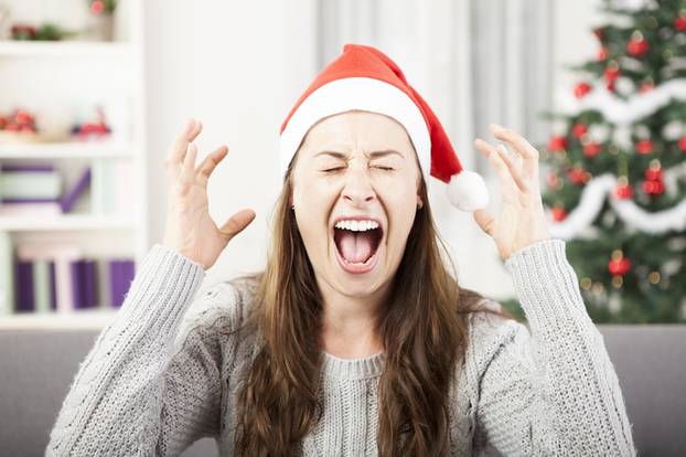 young girl shout because of christmas stress