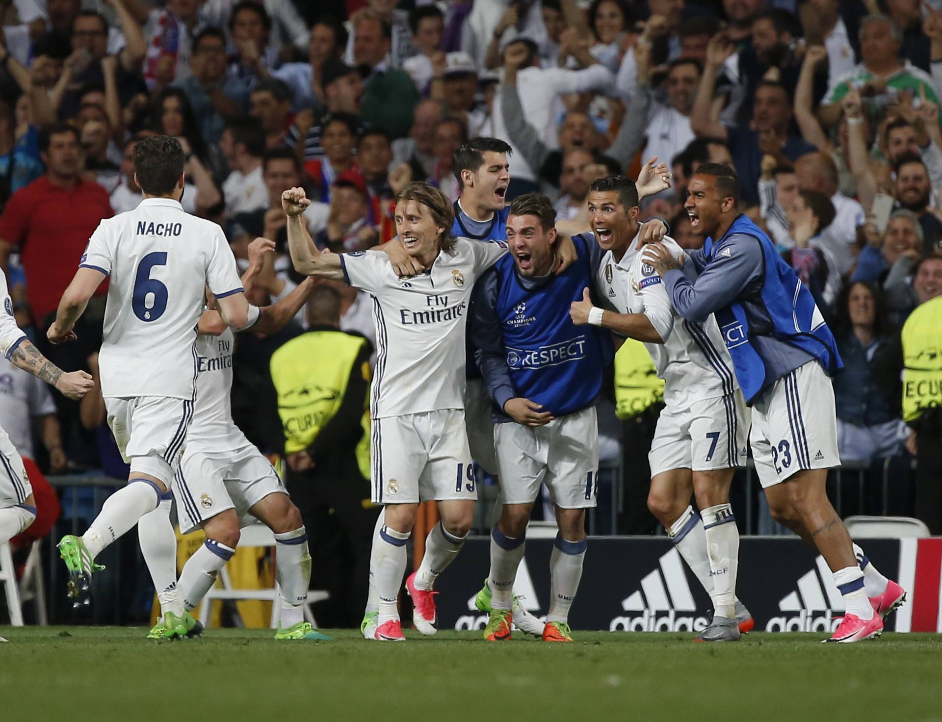 Real Madrid's Cristiano Ronaldo celebrates scoring their second goal with teammates