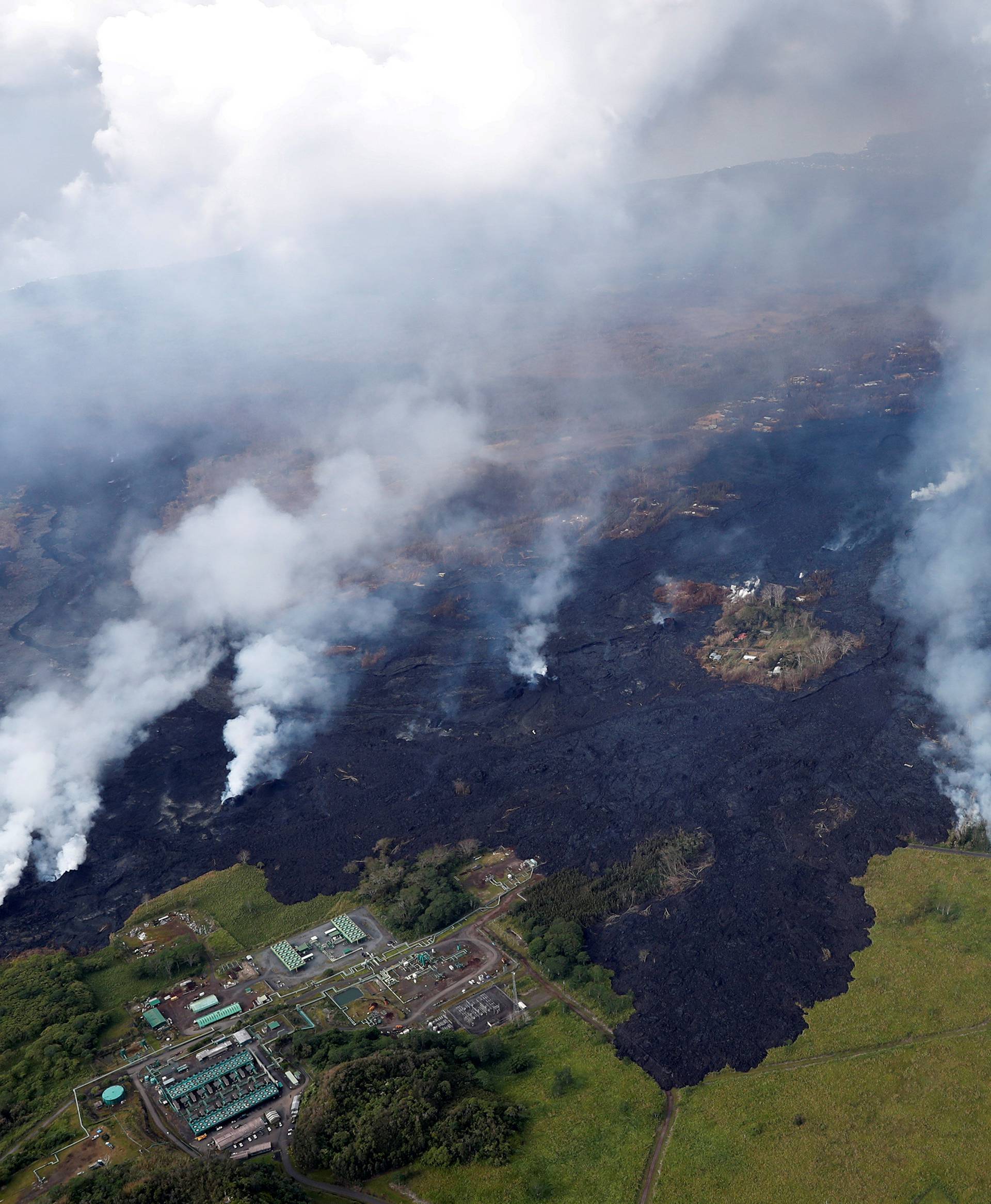 Lava approaches Puna Geothermal Venture, bottom left, in the Leilani Estates near Pahoa, Hawaii