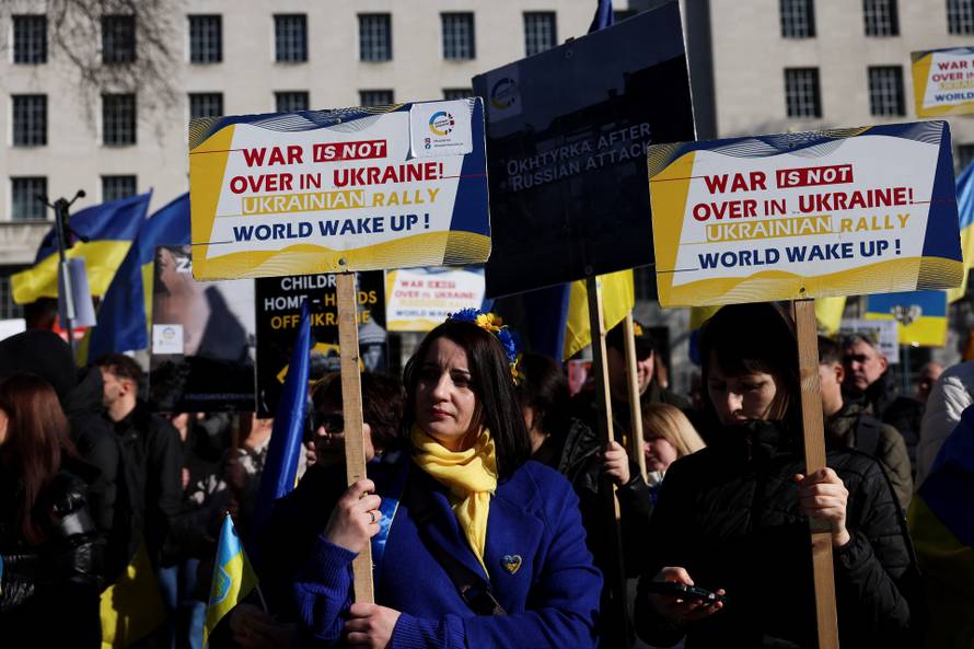 People protest outside Downing Street in London