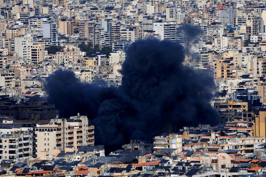 Smoke billows after an Israeli strike on Beirut's southern suburbs