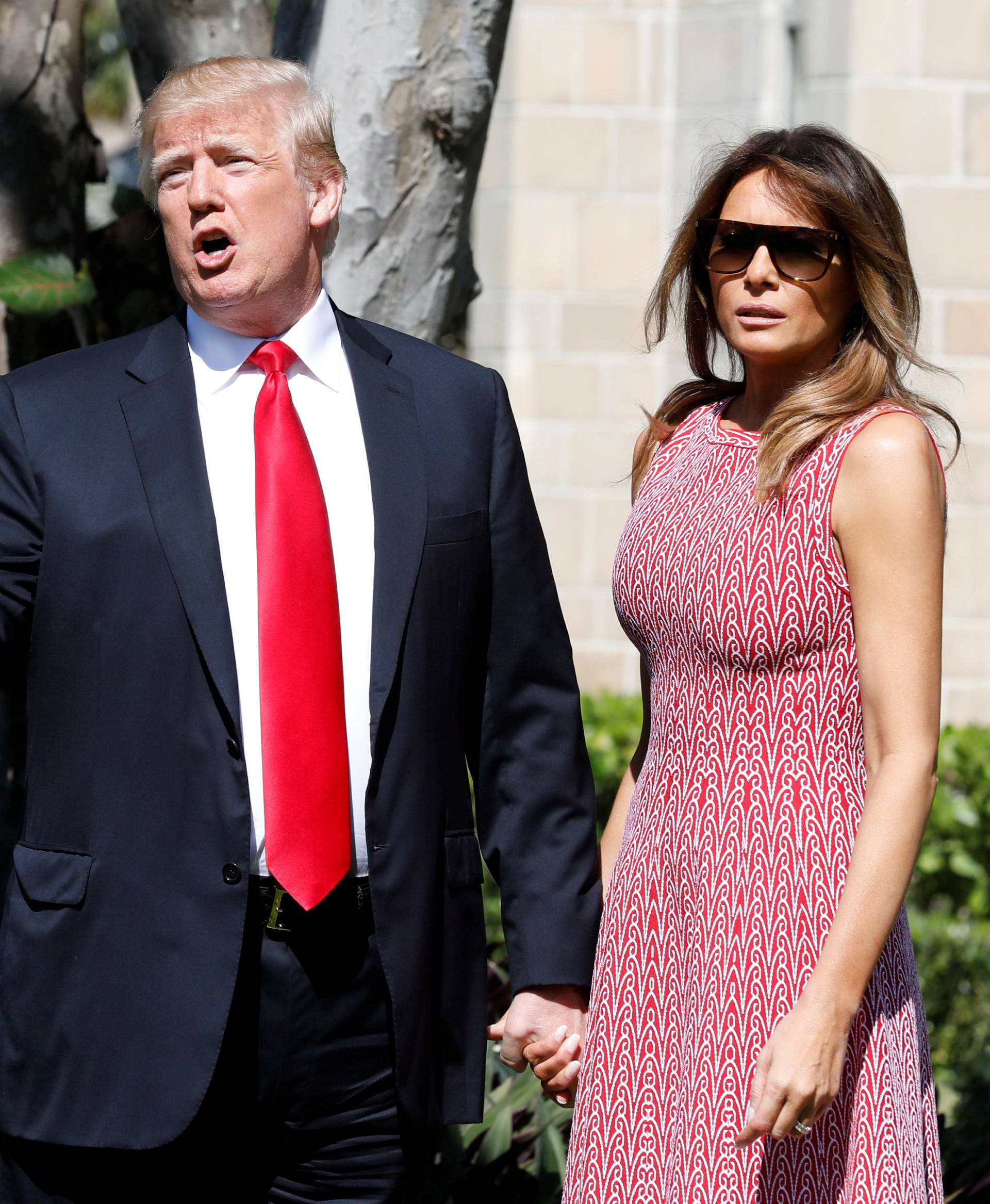 President Donald Trump and first lady Melania Trump arrive for the Easter service at Bethesda-by-the-Sea Episcopal Church in Palm Beach