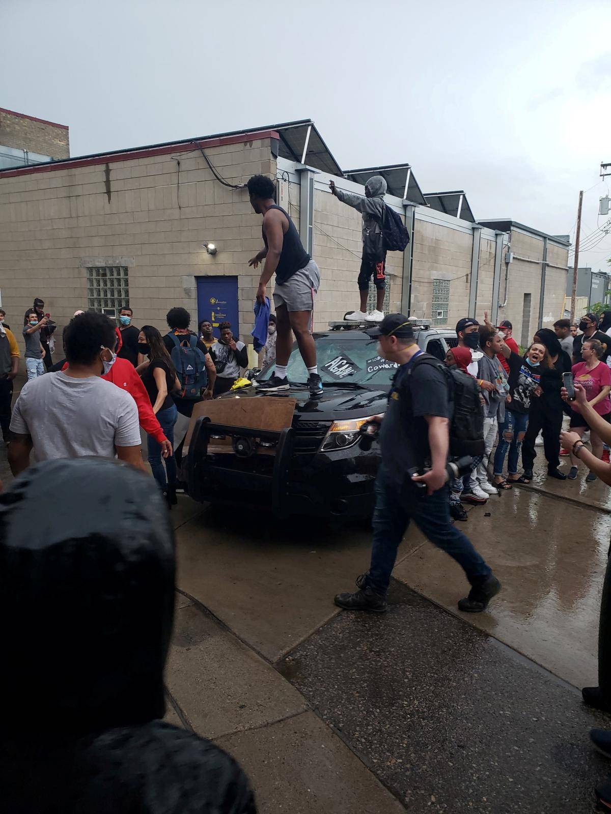 People take part in a protest after the death of George Floyd in Minneapolis