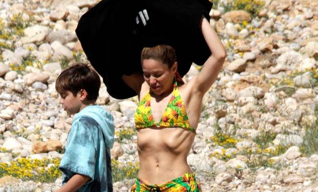 *EXCLUSIVE* WEB MUST CALL FOR PRICING  - Out soaking up the Spanish sunshine, the Colombian superstar singer shows off her svelte physique on her holidays on the Pitiusas Islands.*PICTURES TAKEN ON 17/04/2022*