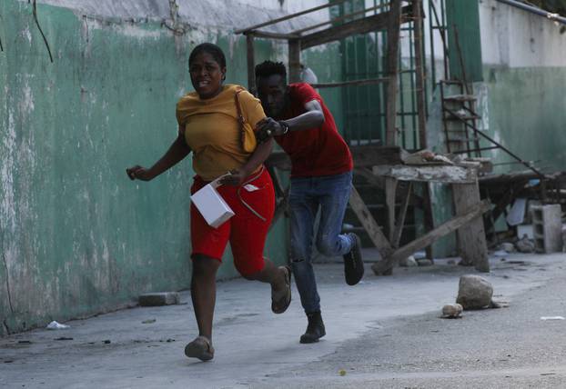 People demonstrate against the government and insecurity in Port-au-Prince