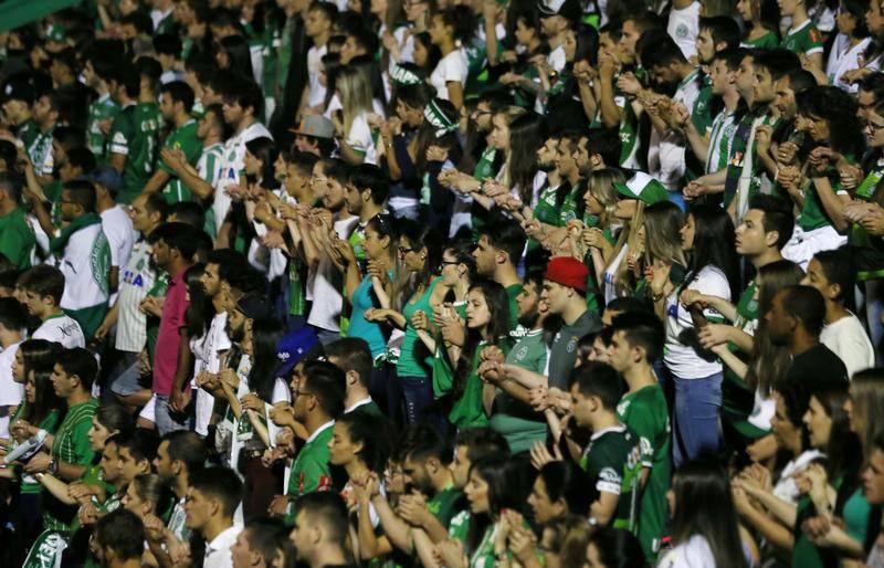 Fans of Chapecoense soccer team pay tribute to Chapecoense's players at the Arena Conda stadium in Chapeco