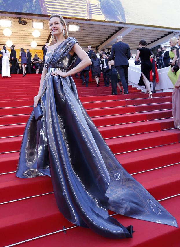 Model Petra Nemcova poses on the red carpet as she arrives for the screening of the film "Julieta" in competition at the 69th Cannes Film Festival in Cannes