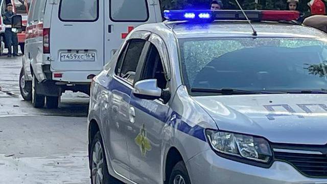 Police officers block a street near the site of the blast in the center of Taganrog