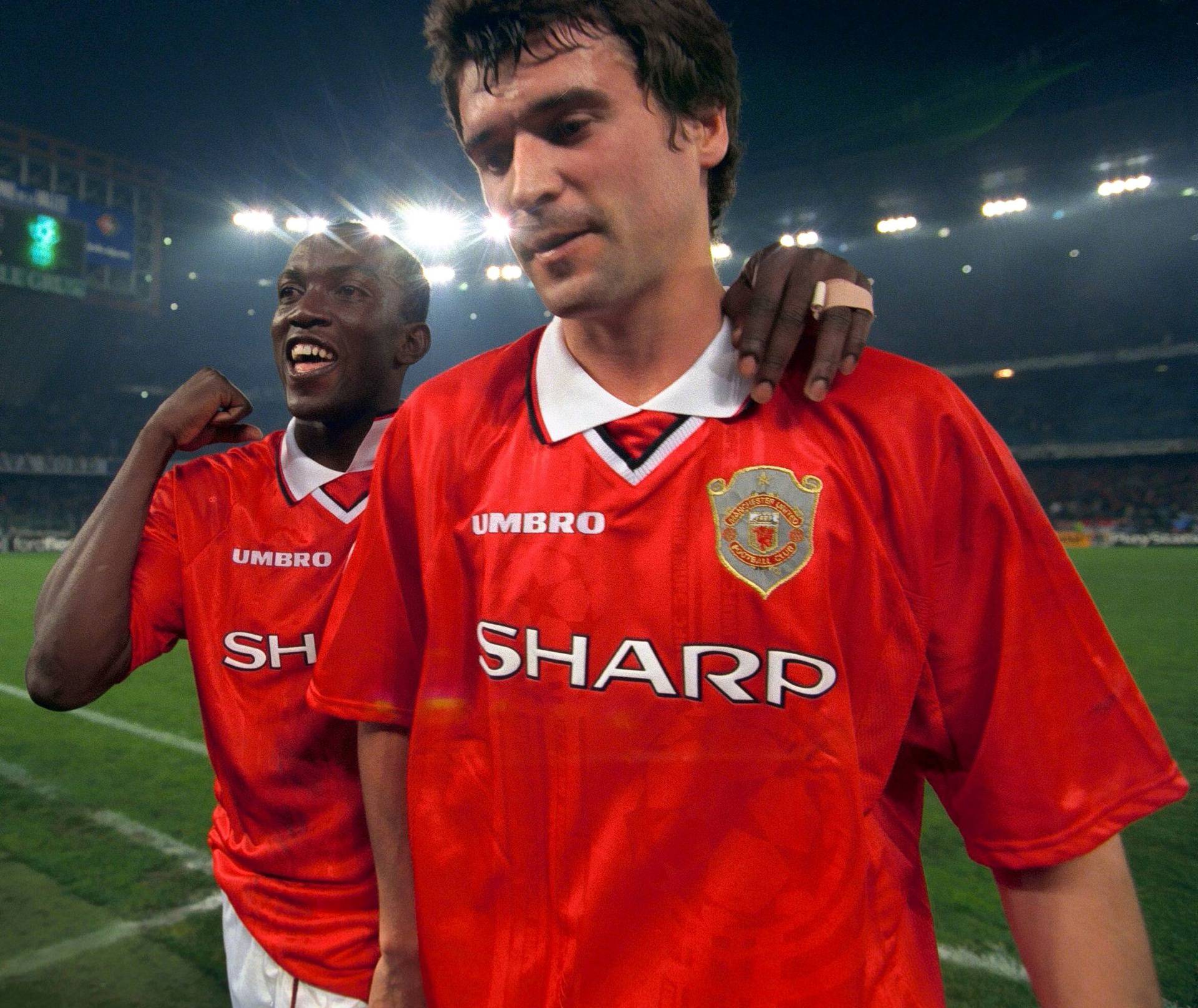 FILE PHOTO: Manchester United's Dwight Yorke and Roy Keane celebrate their 3-2 win against Juventus in their Champions League semi-final second leg match in Turin, Italy