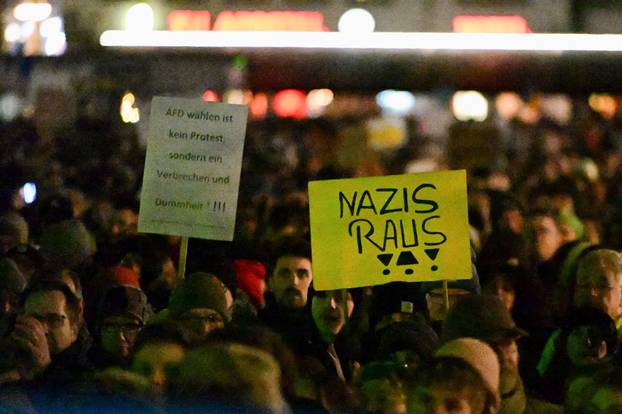 People protest against the Alternative for Germany party (AfD), in Cologne