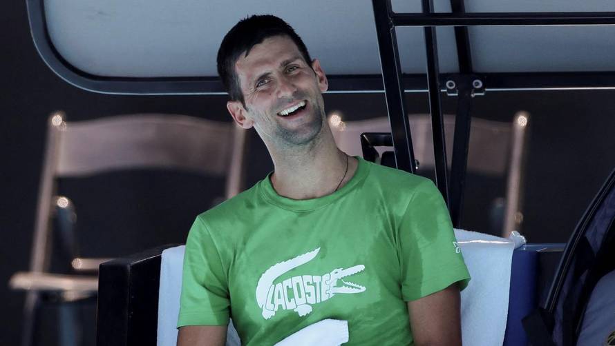 Serbian tennis player Novak Djokovic practices at Melbourne Park as questions remain over the legal battle regarding his visa to play in the Australian Open