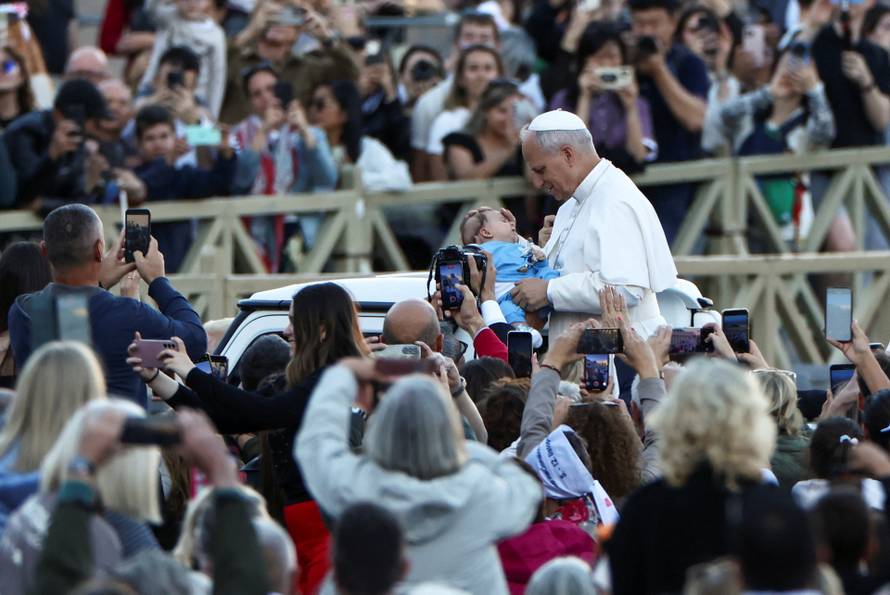 Pope Leo XIV greets the faithful ahead of a Holy Mass presided over by Metropolitan Archbishop of Zagreb Drazen Kutlesa, at the Vatican