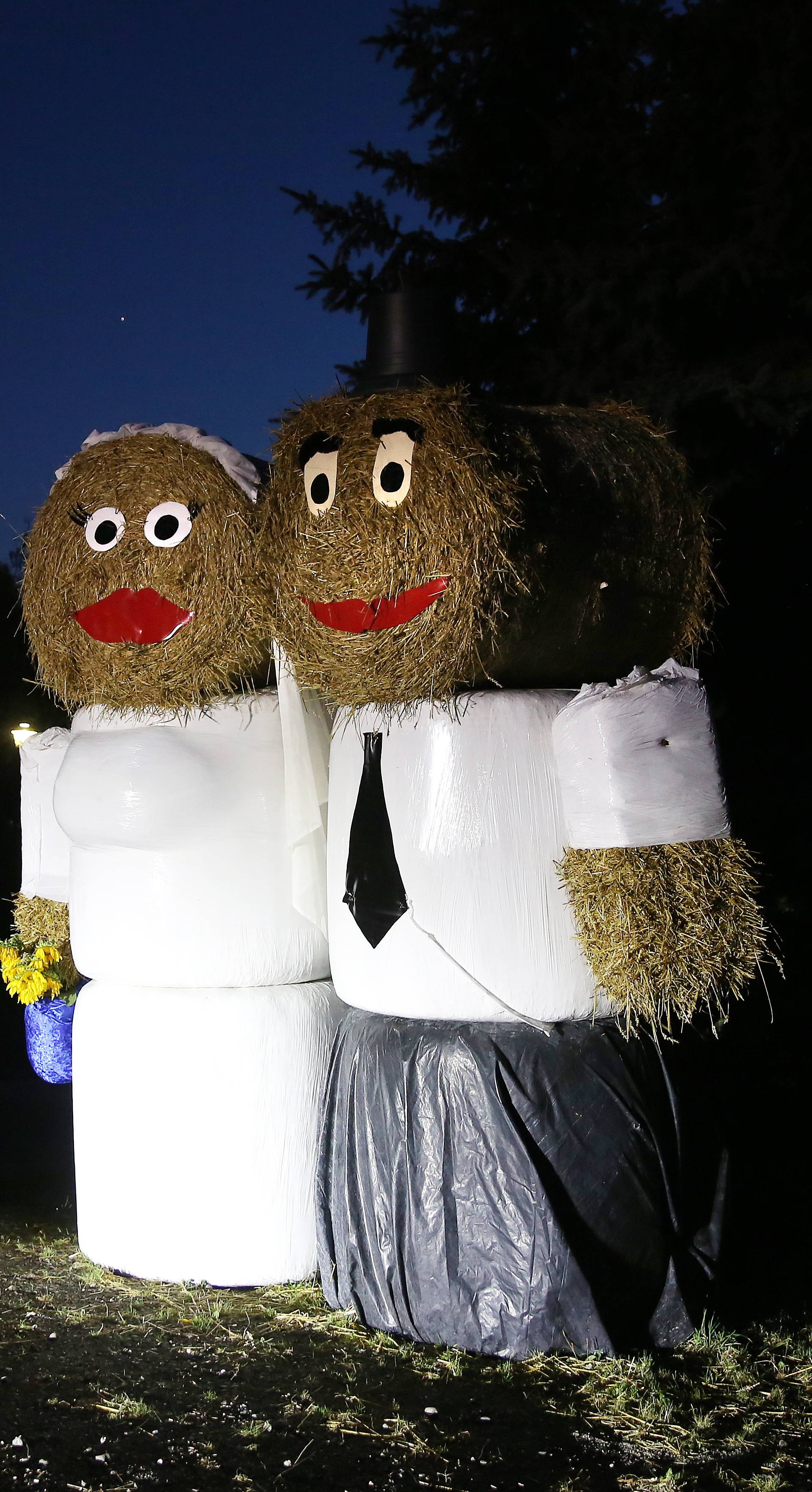 Bride and groom made of straw