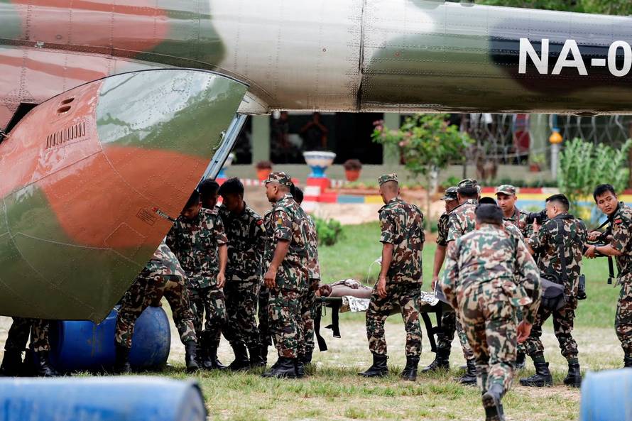 A survivor is airlifted following a flash flood at Trishuli, Nepal