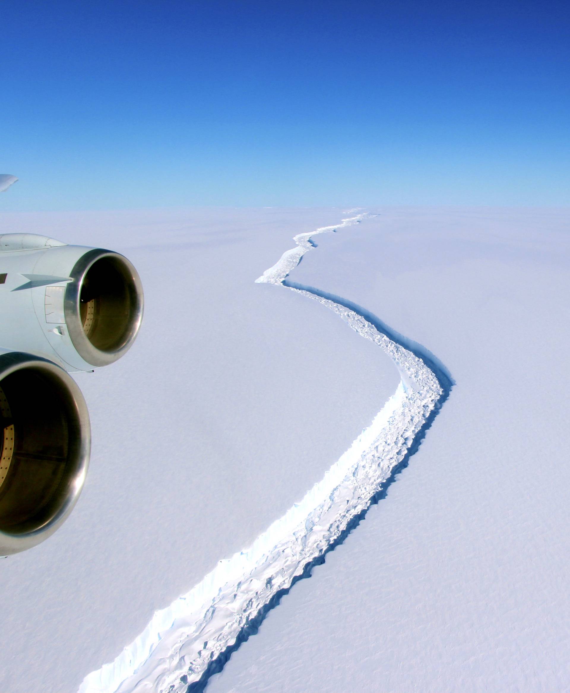 FILE PHOTO: A rift across the Larsen C Ice Shelf that had grown longer and deeper is seen during an airborne surveys of changes in polar ice over the Antarctic Peninsula