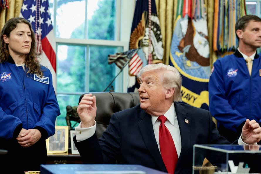 U.S. President Donald Trump meets Artemis II astronauts in the Oval Office at the White House in Washington