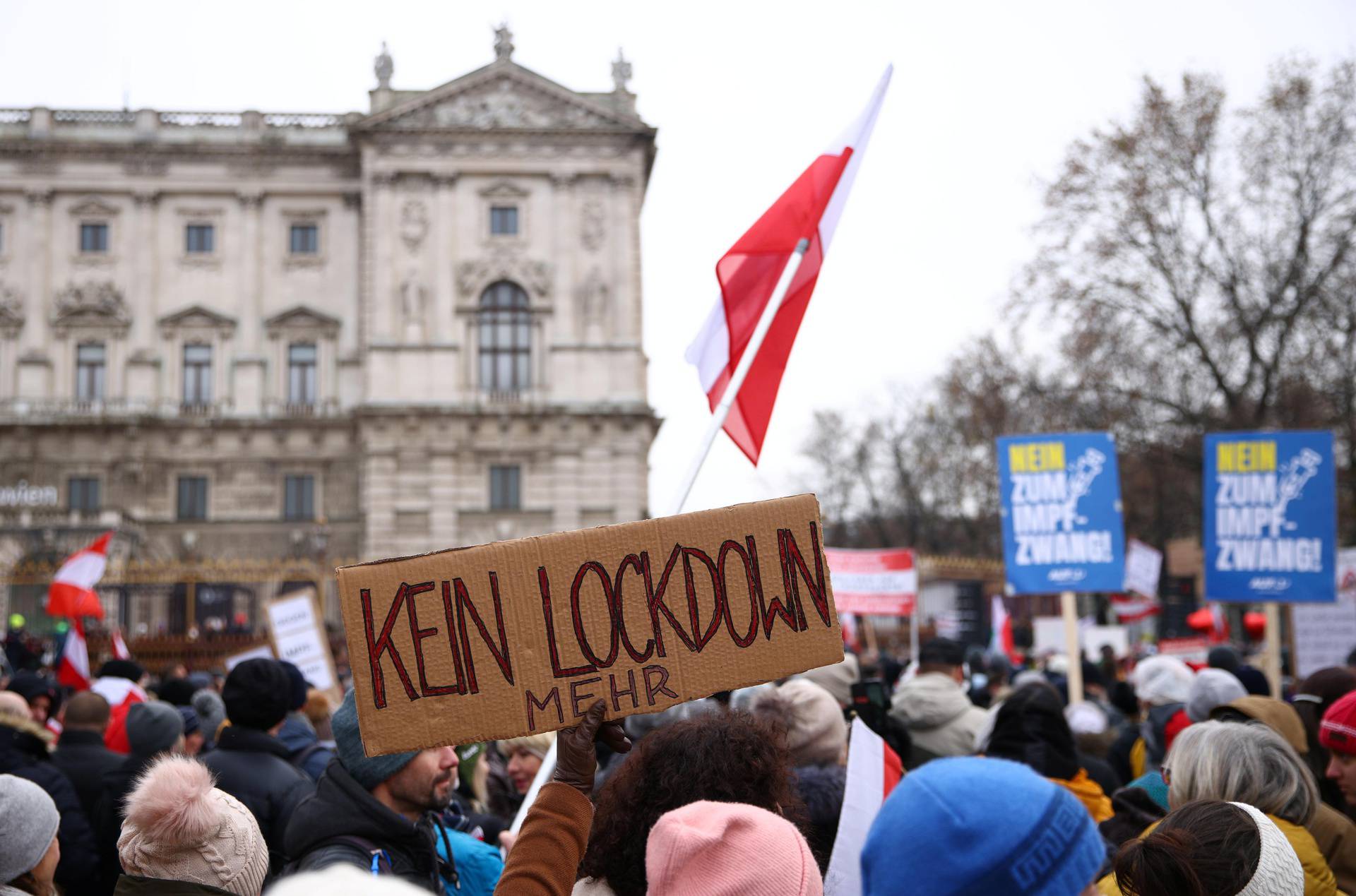 Thousands of people march to protest against restrictions on public life to curb the coronavirus pandemic