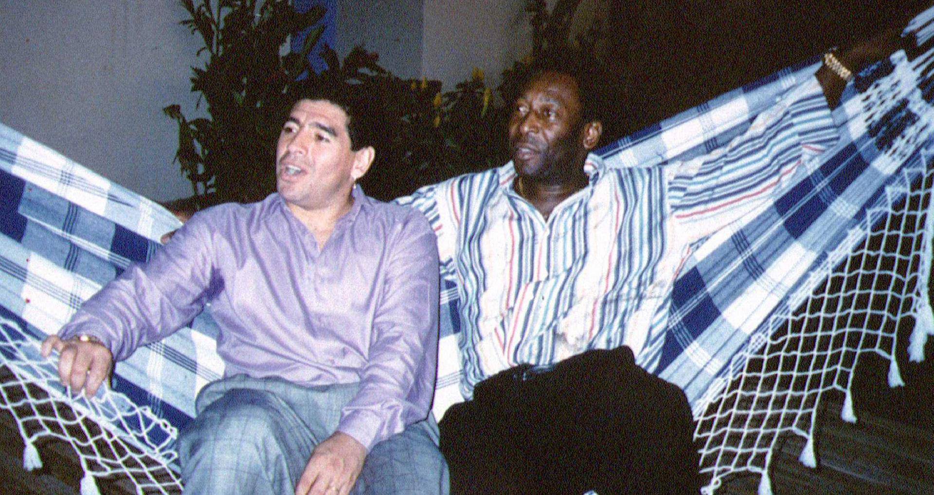 FILE PHOTO:  Soccer legends Maradona and Pele