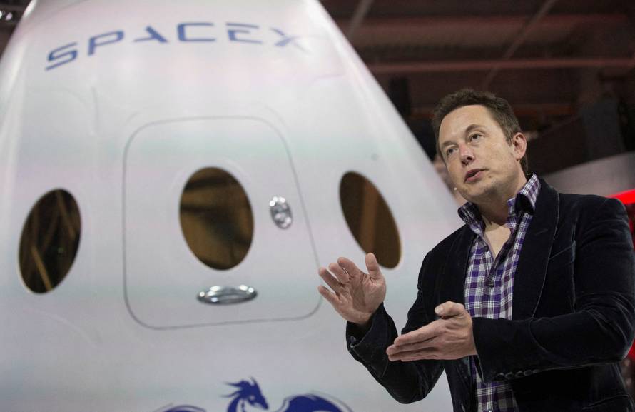 FILE PHOTO: File photo of SpaceX CEO Musk speaking after unveiling the Dragon V2 spacecraft in Hawthorne