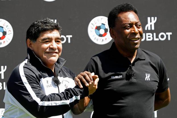 Football legends Pele and Diego Maradona attend an advertising soccer event on the eve of the opening of the UEFA 2016 European Championship in Paris