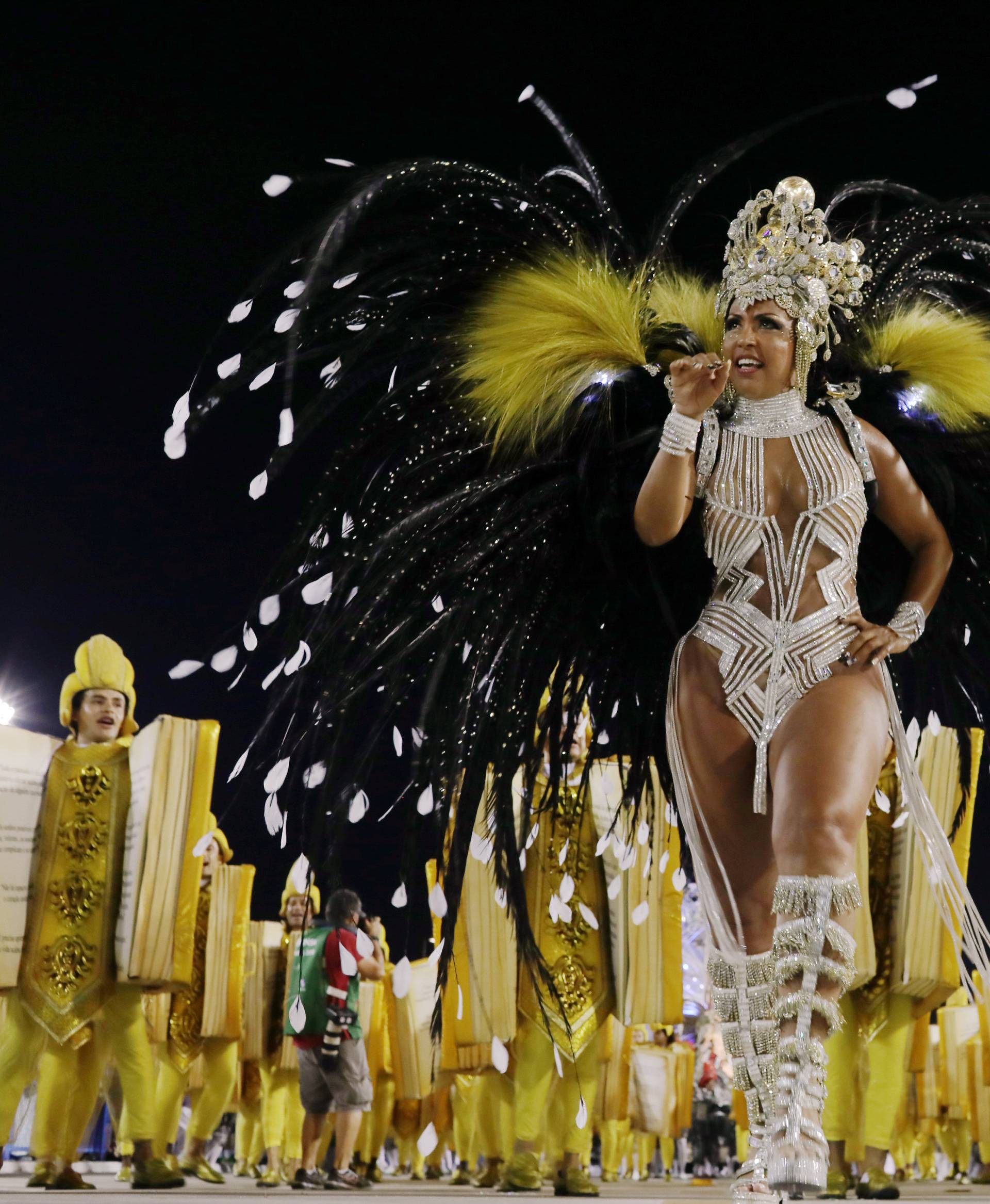 Revellers from Unidos da Tijuca Samba school perform during the second night of the Carnival parade at the Sambadrome in Rio de Janeiro