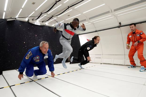 Retired sprinter Usain Bolt, French astronaut Jean-Francois Clervoy and French Interior designer Octave de Gaulle enjoy zero gravity conditions during a flight in a specially modified plane above Reims