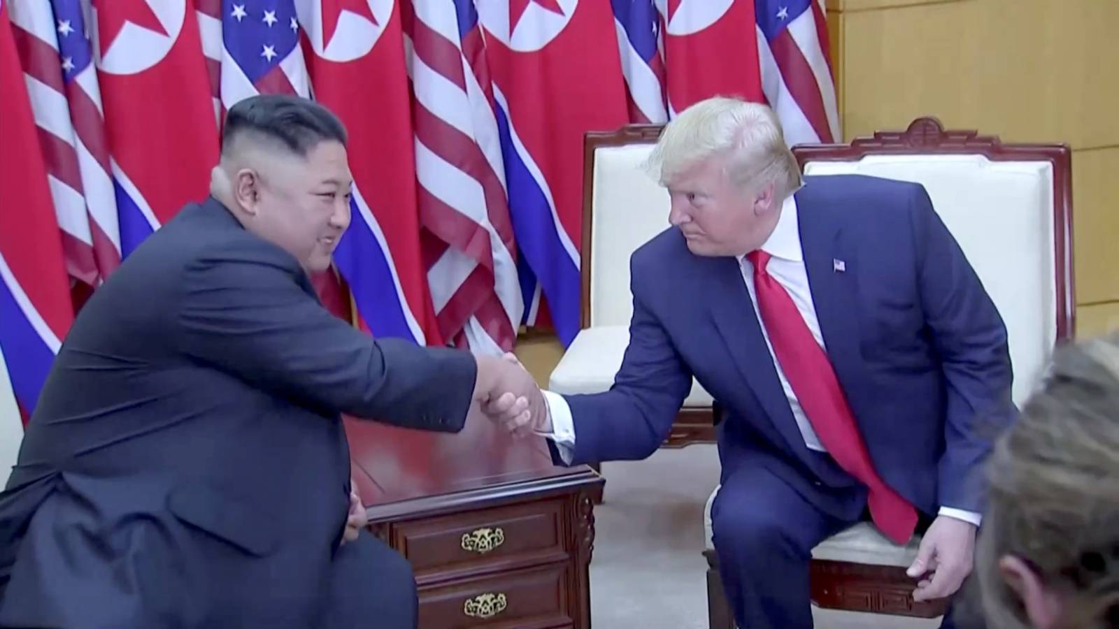 U.S. President Donald Trump meets with North Korean leader Kim Jong Un at the DMZ separating the two Koreas, in Panmunjom