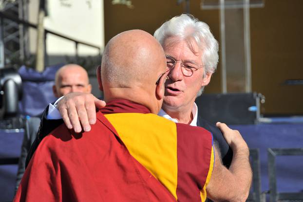 Pisa, The Dalai Lama (accompanied by Richard Gere) meets the public and the schools