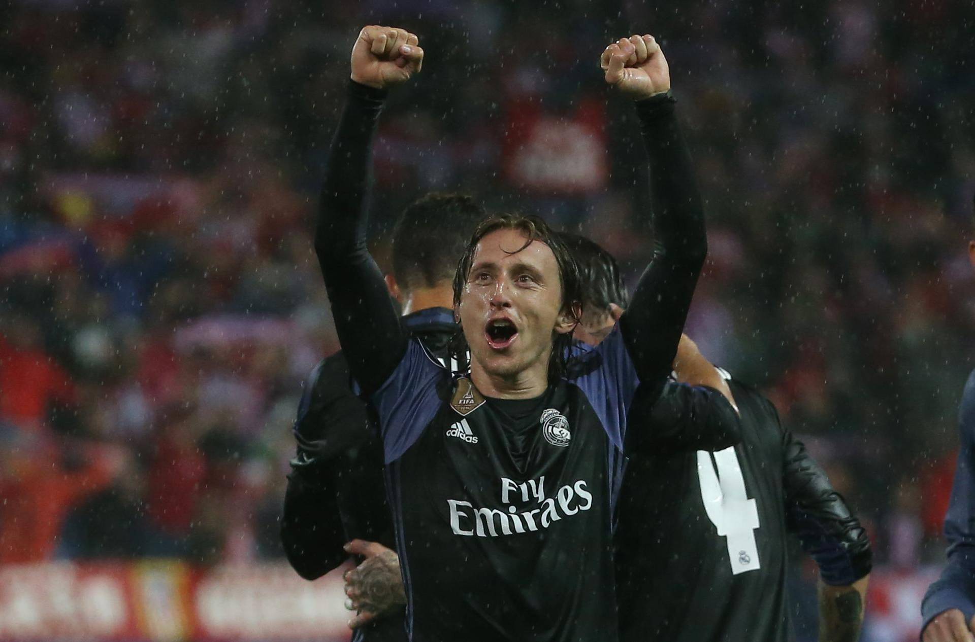 Real Madrid's Luka Modric celebrates after the match