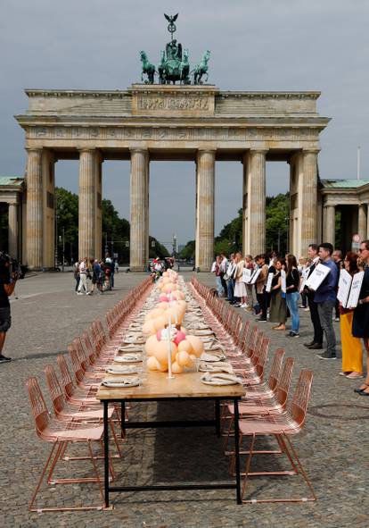 People working in the wedding industry protest against restrictions in the business in front of the Brandenburg Gate, following the coronavirus disease (COVID-19) outbreak in Berlin