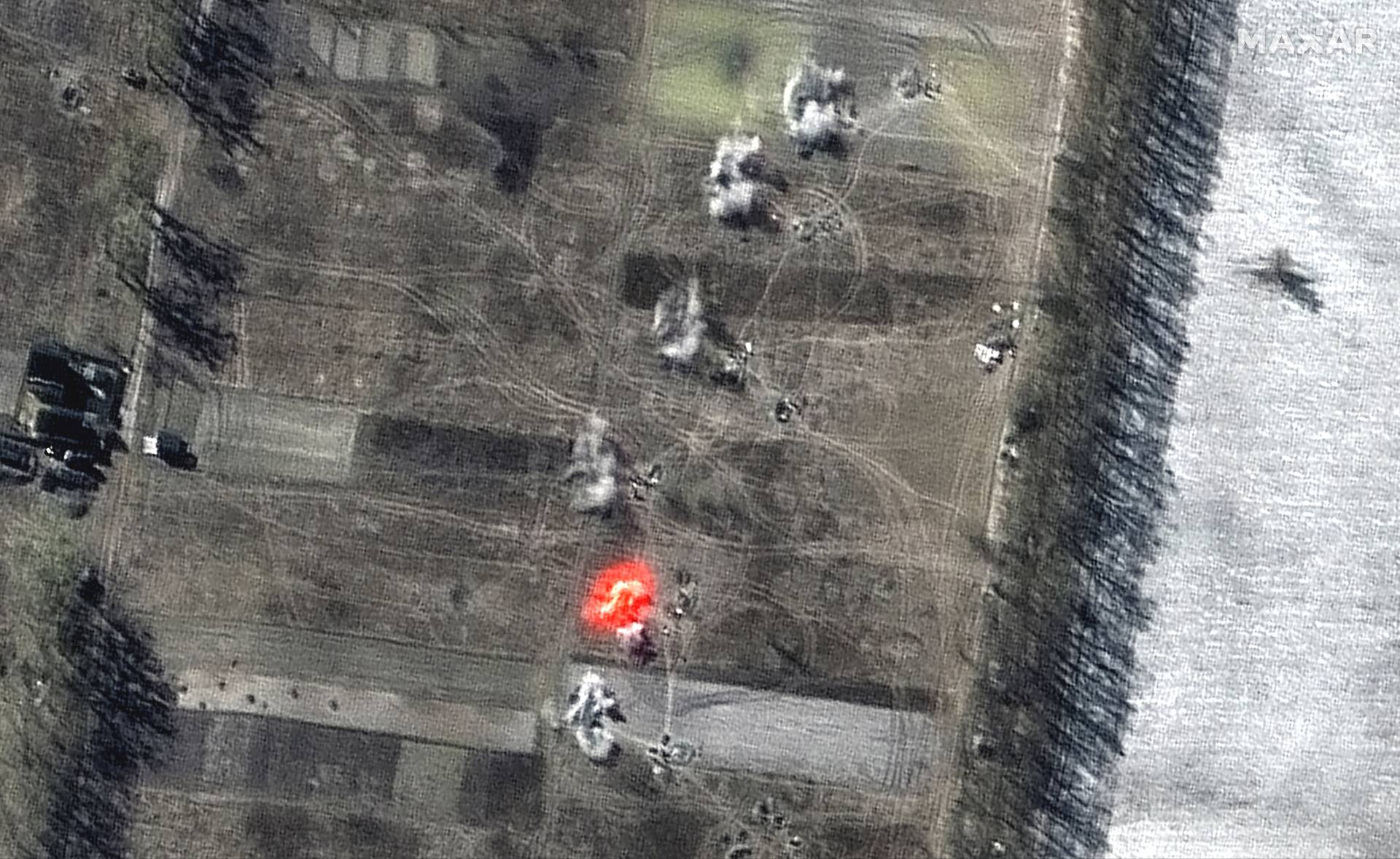 A satellite image shows a multispectral closer view of artillery firing, in Ozera, near Antonov Airport