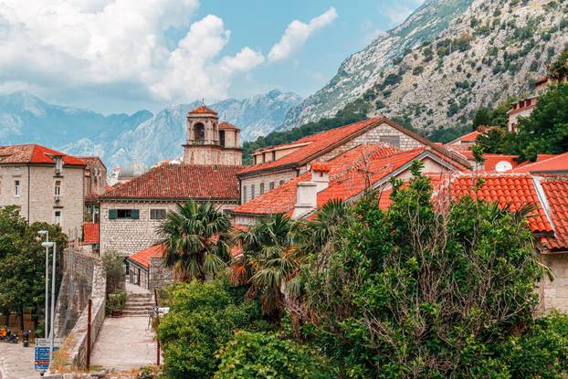 Old stone houses in the town Kotor surrounded by high mountains, Montenegro