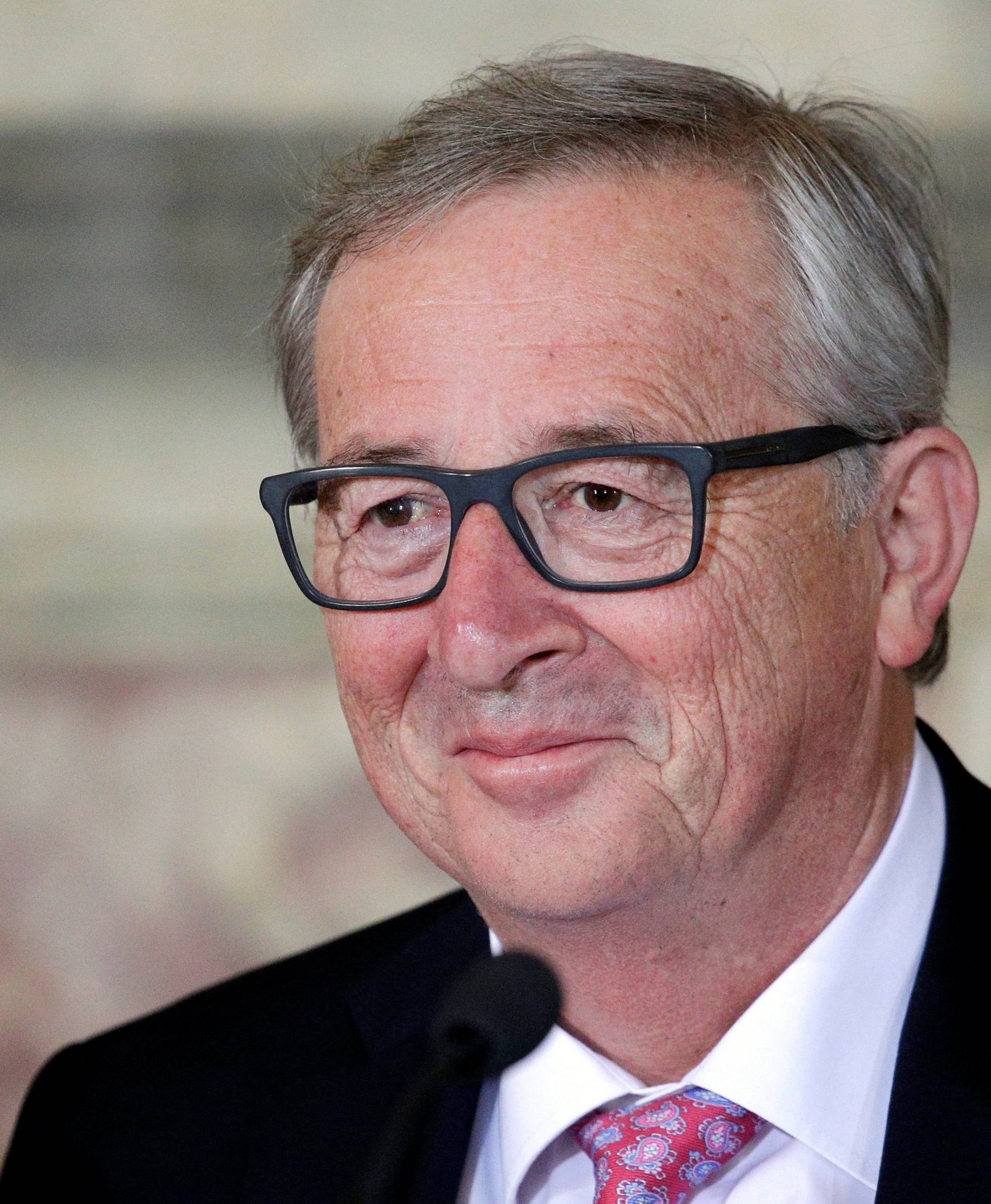 European Commission President Juncker looks on during a meeting at the Capitol Hill in Rome