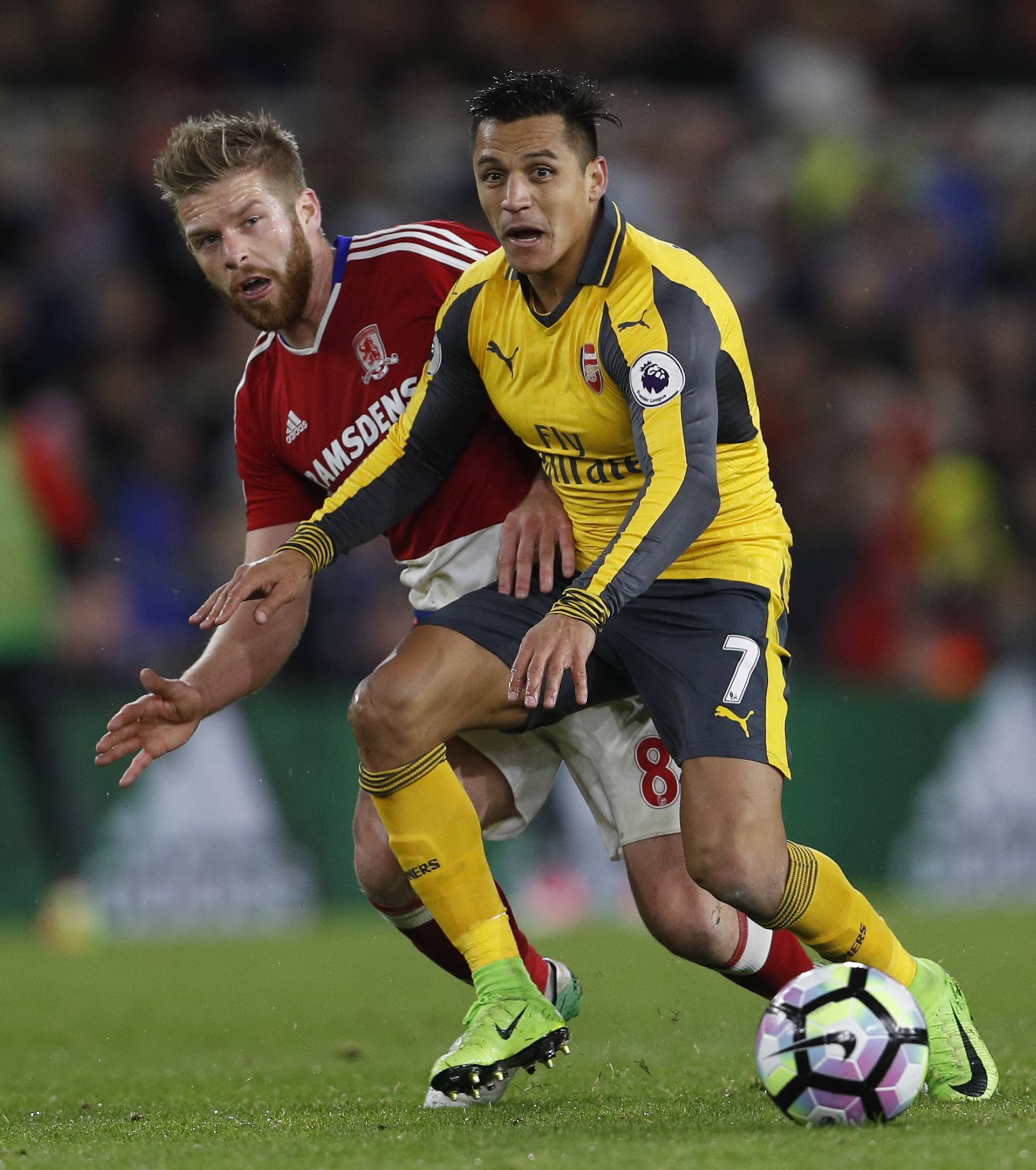 Arsenal's Alexis Sanchez in action with Middlesbrough's Adam Clayton