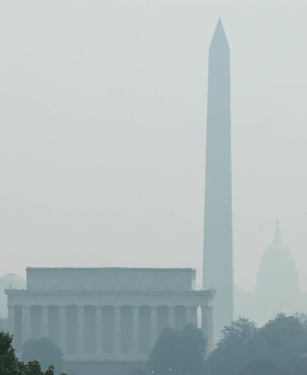 Smoke from Canadian wildfires clouds the National Mall and monuments in Washington