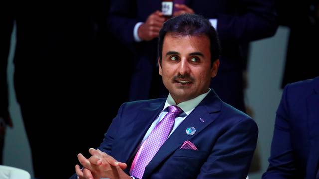 Qatar's Sheikh Tamim bin Hamad Al Thani arrives to attend the Paris Peace Forum