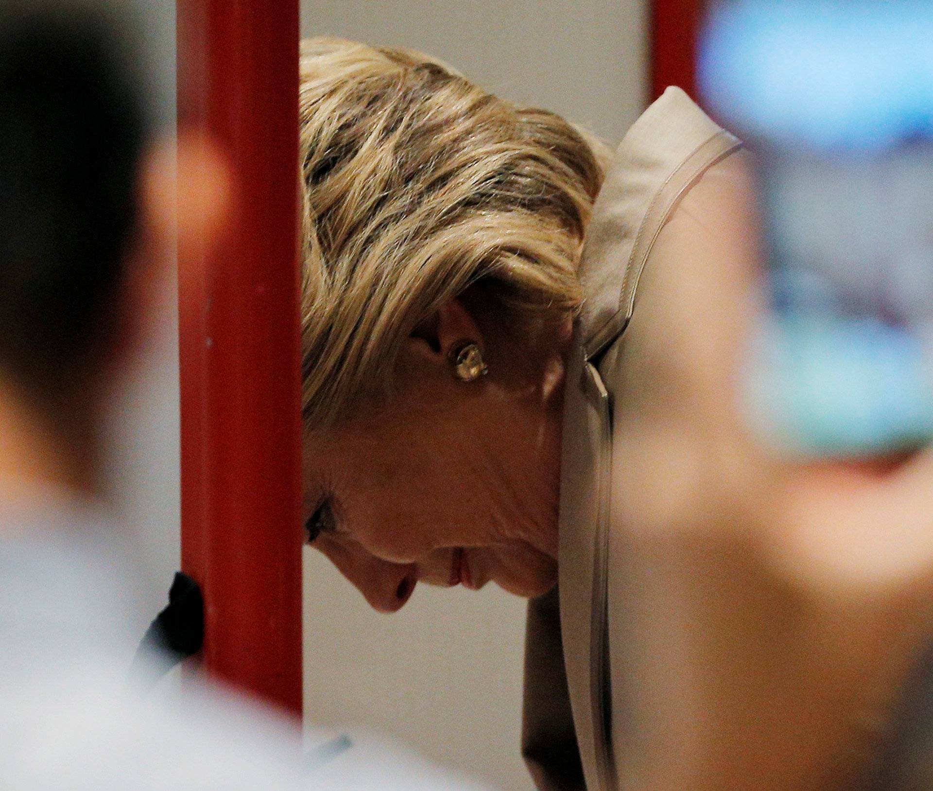 U.S. Democratic presidential nominee Hillary Clinton fills out her ballot at the Douglas Grafflin Elementary School in Chappaqua