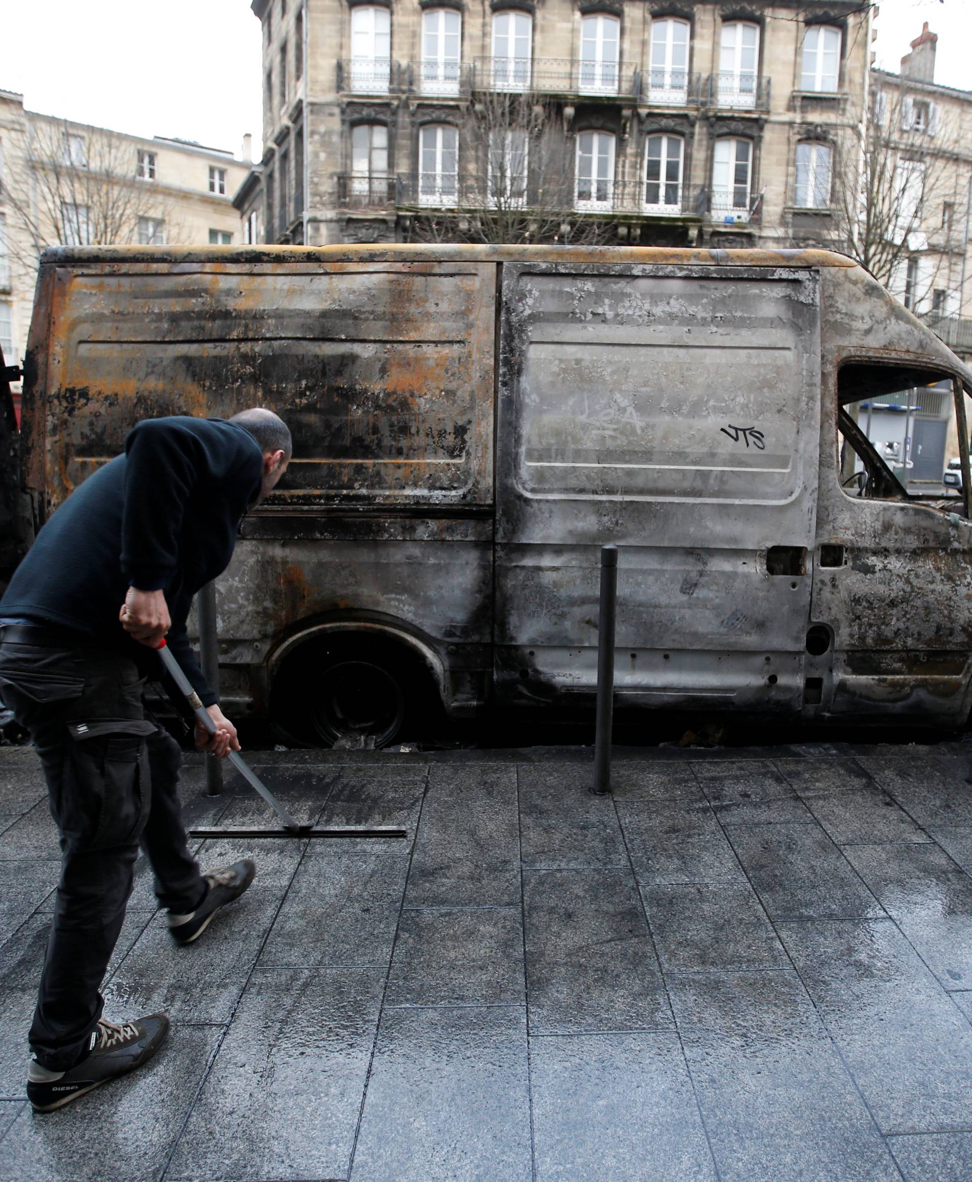 A vandalized truck is seen the day after clashes during a national day of protest by the "yellow vests" movement in Bordeaux