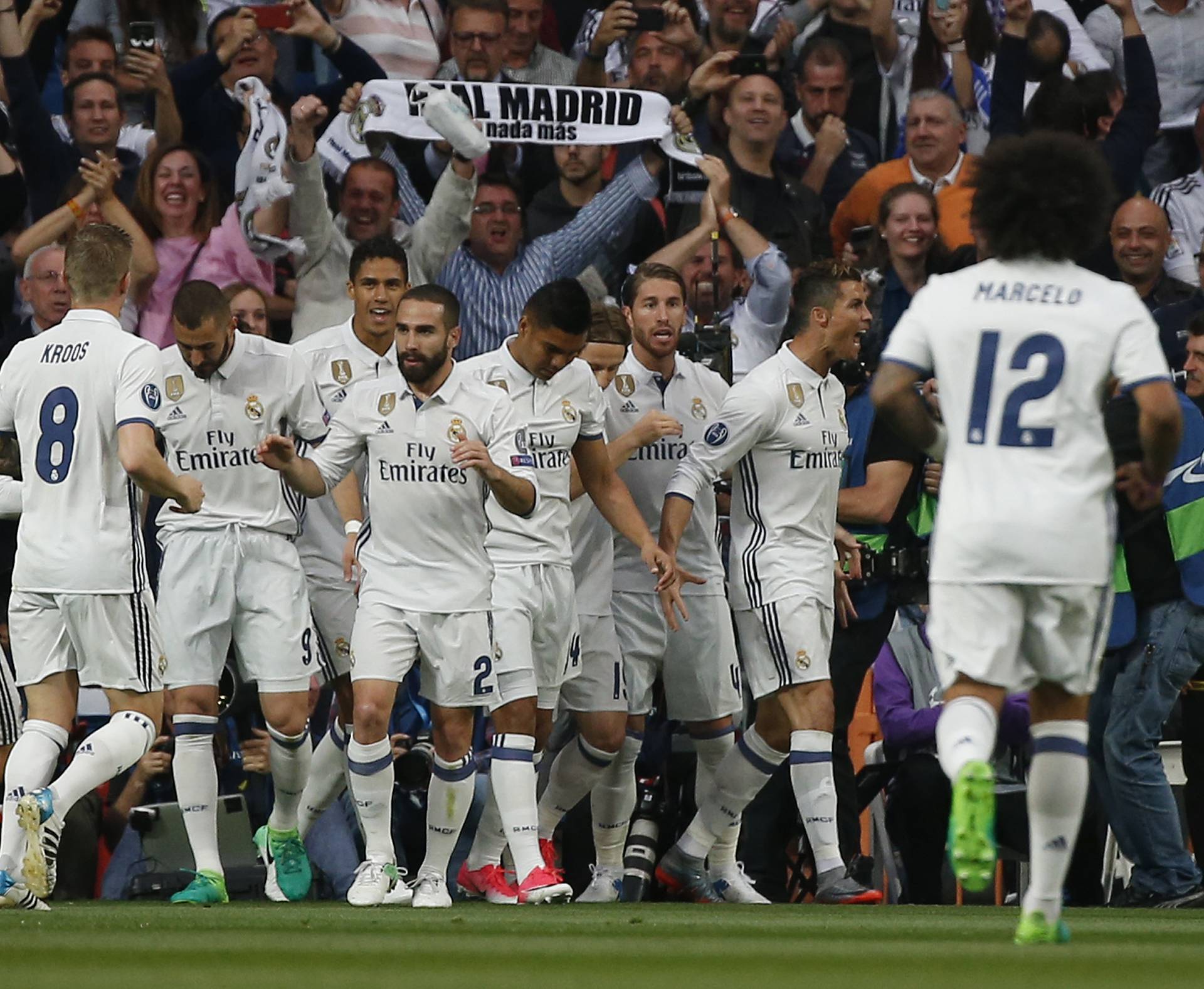 Real Madrid's Cristiano Ronaldo celebrates scoring their first goal with team mates