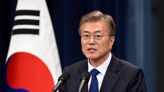 South Korea's new President Moon Jae-In speaks during a press conference at the presidential Blue House in Seoul