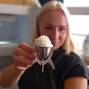 A view shows the world's first vanilla ice cream made with plastic waste, held up for the camera by its maker, artist and designer Eleanora Ortolani at Central Saint Martins in London