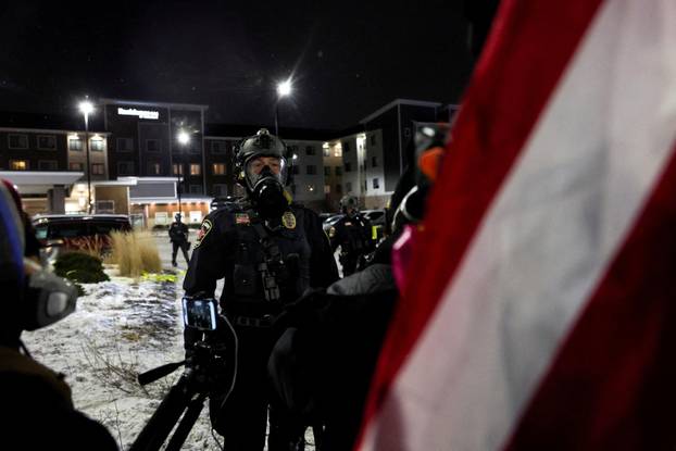 Protest outside the hotel where Bovino, who has been removed from his role, is reportedly staying, in Maple Grove
