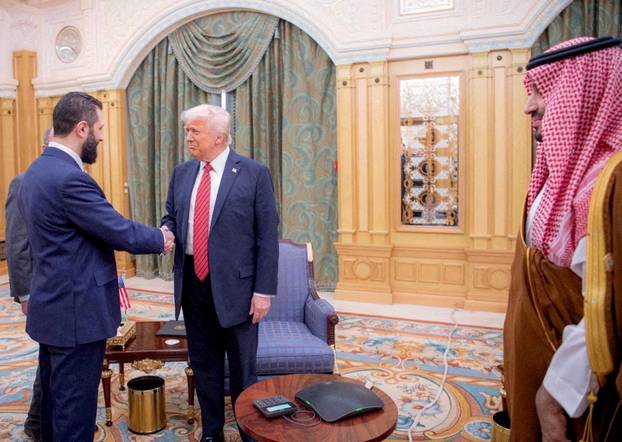 FILE PHOTO: U.S. President Donald Trump meets Syrian President Ahmed al-Sharaa in Riyadh