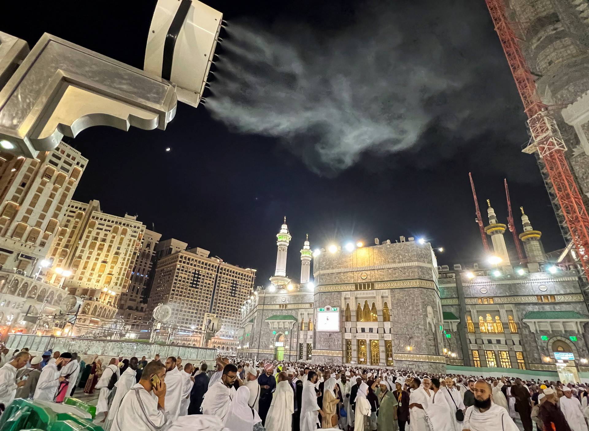 Muslim pilgrims perform the Umrah at the holy Kaaba, in the holy city of Mecca