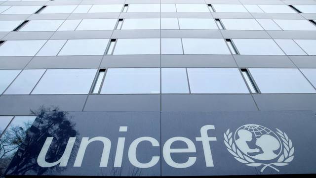 FILE PHOTO: A UNICEF logo is pictured outside their offices in Geneva