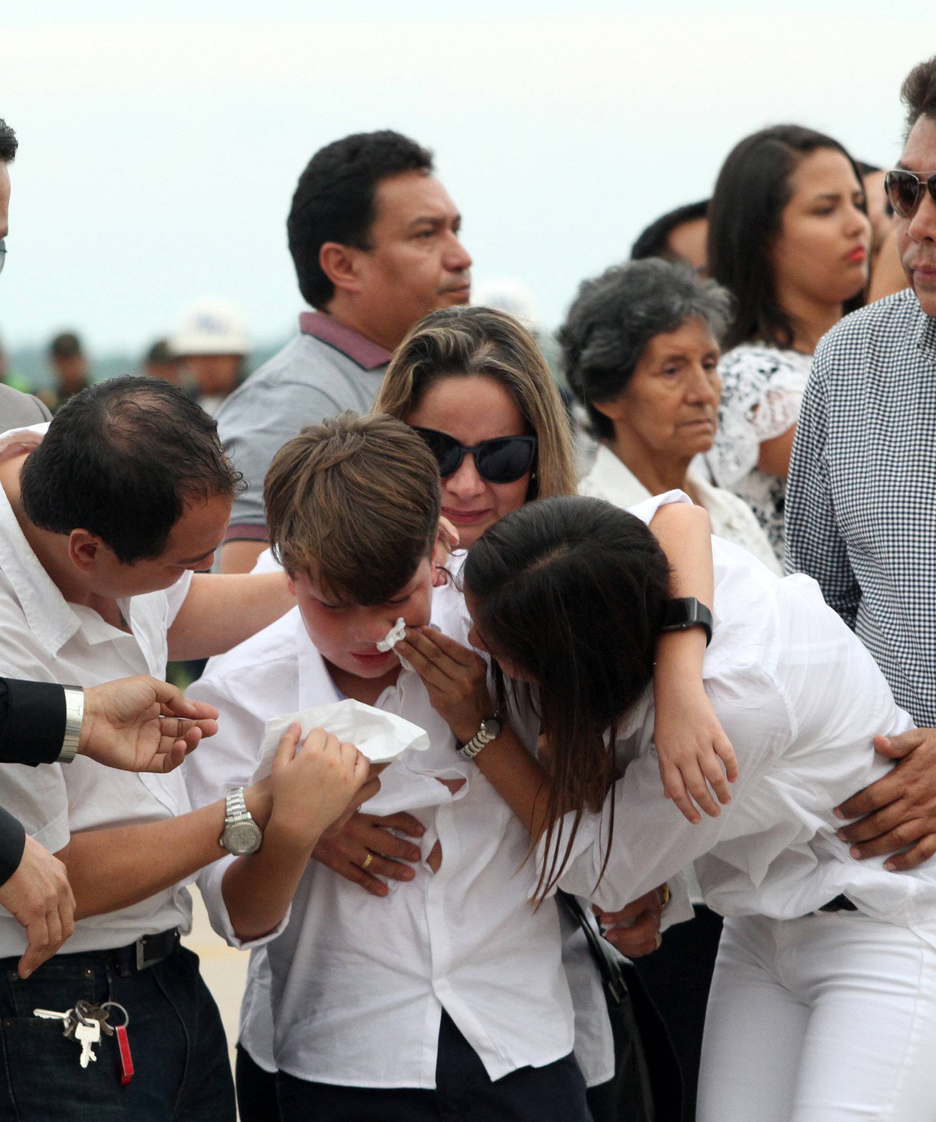 Relatives of Sisy Arias, who died when the plane carrying Brazilian soccer team Chapecoense crashed in Colombia, react at Viru Viru airport in Santa Cruz