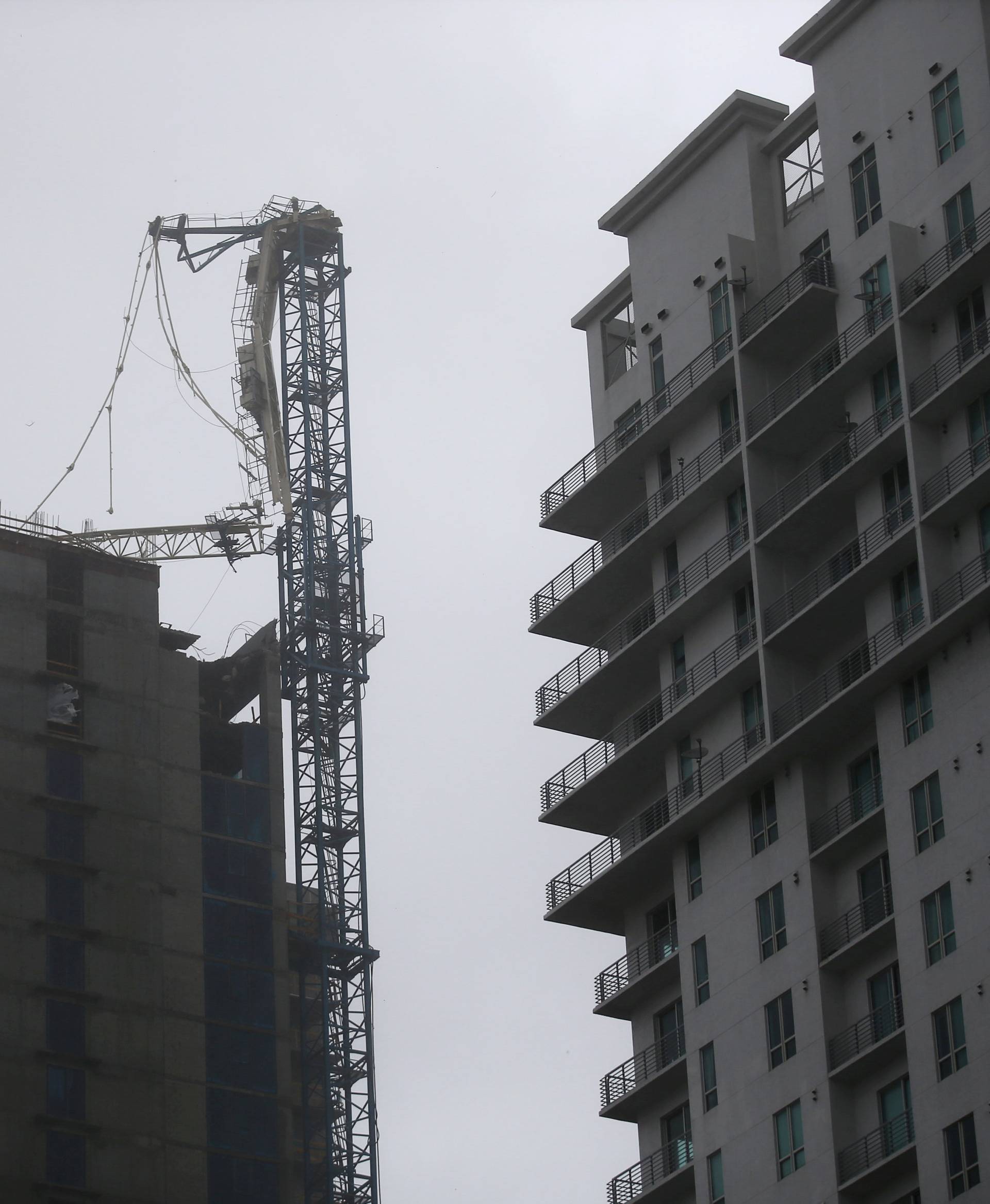 A collapsed construction crane is seen in Downtown Miami as Hurricane Irma arrives at south Florida